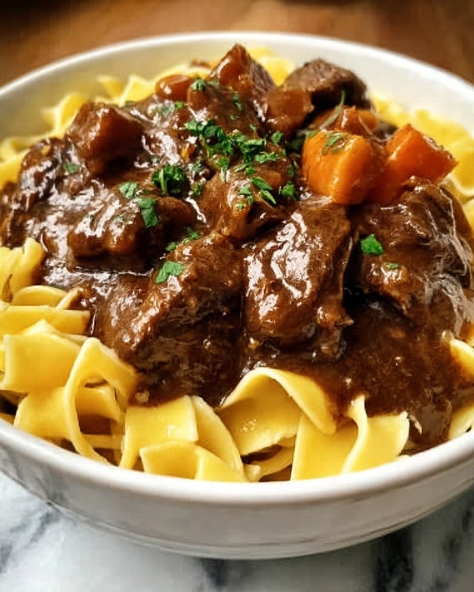 Savory Beef Tips with Buttery Noodles Recipe - Recipe Image